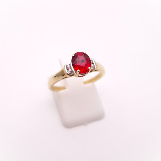 9ct Yellow Gold Red Garnet Solitaire and White Topaz Set Shoulders Ring