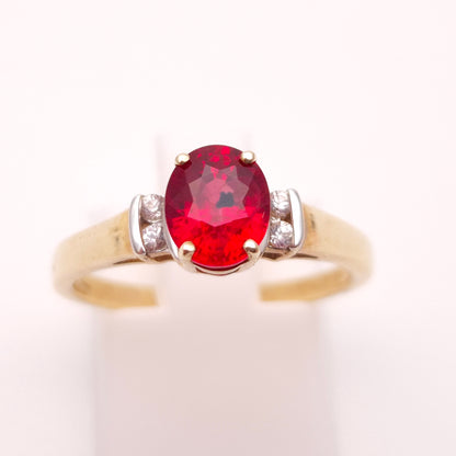9ct Yellow Gold Red Garnet Solitaire and White Topaz Set Shoulders Ring