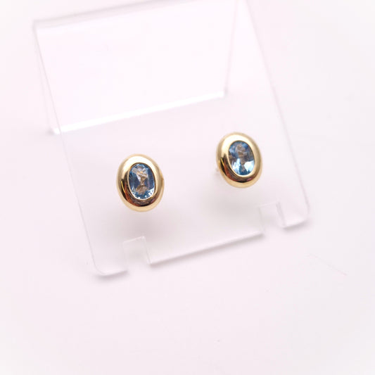 9ct Yellow gold Blue Topaz Bezel Set Stud Earrings