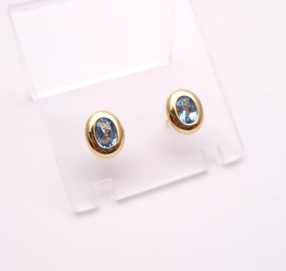 9ct Yellow gold Blue Topaz Bezel Set Stud Earrings
