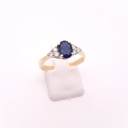 9ct Yellow Gold Oval Blue Sapphire and 0.25tcw Diamond Shoulders Ring