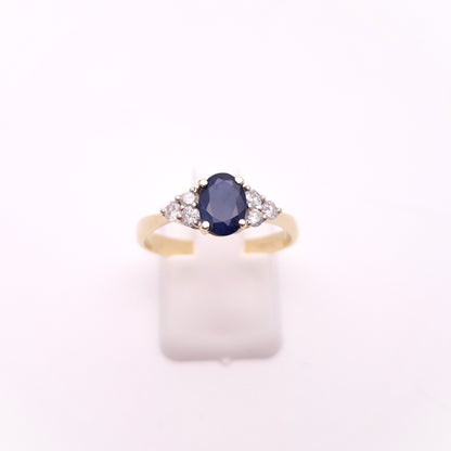 9ct Yellow Gold Oval Blue Sapphire and 0.25tcw Diamond Shoulders Ring