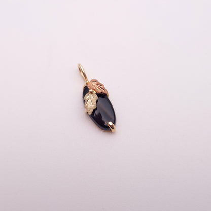 9ct Two-tone Yellow and Rose Gold Leaf Detail Oval Onyx Pendant