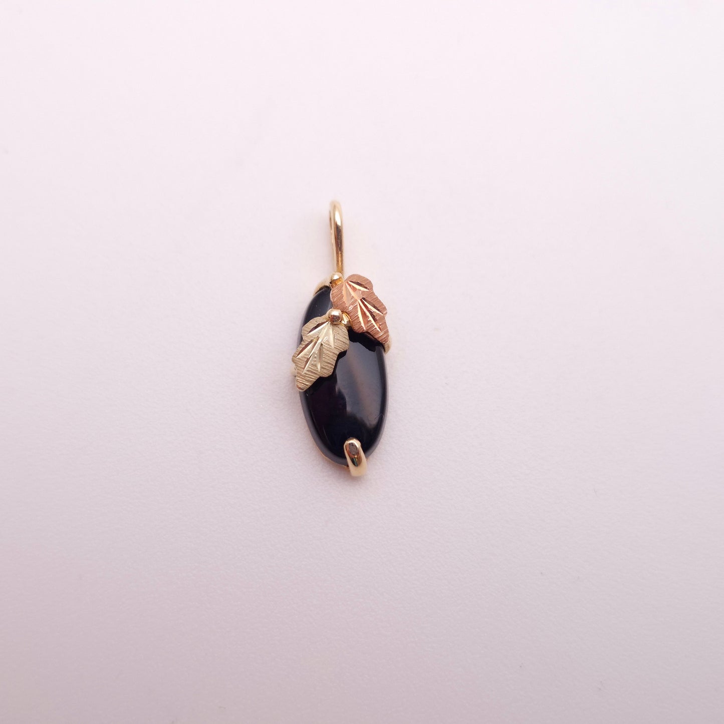 9ct Two-tone Yellow and Rose Gold Leaf Detail Oval Onyx Pendant