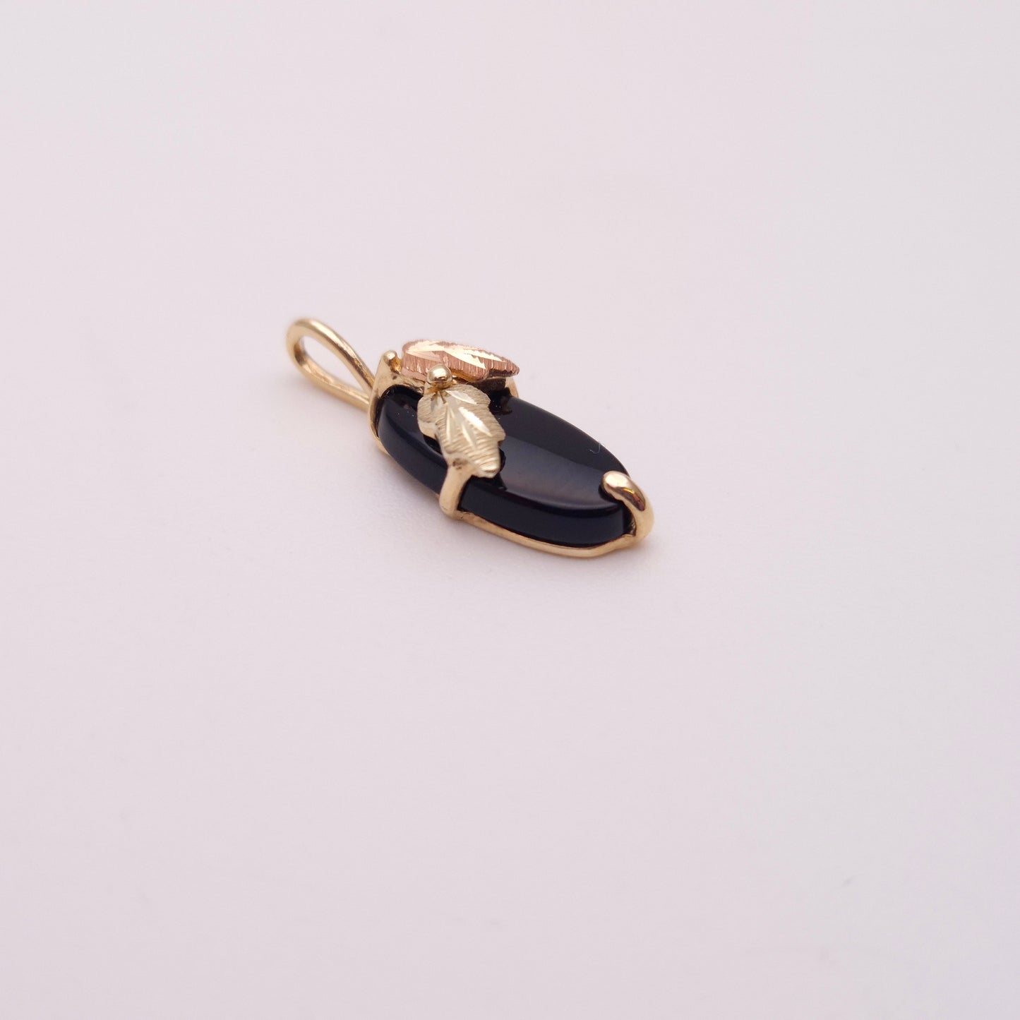 9ct Two-tone Yellow and Rose Gold Leaf Detail Oval Onyx Pendant