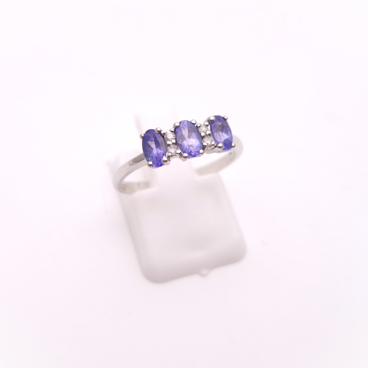 14ct White Gold Three Stone Oval Cut Tanzanite and Diamond Row Ring