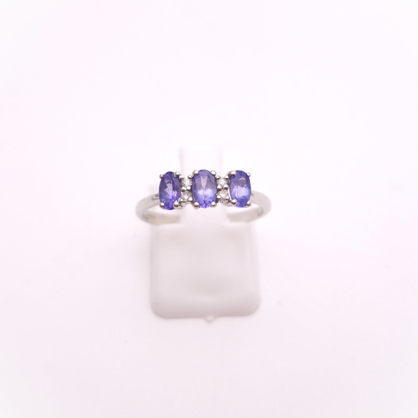 14ct White Gold Three Stone Oval Cut Tanzanite and Diamond Row Ring