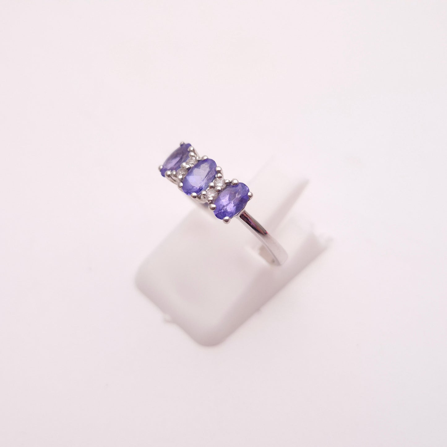 14ct White Gold Three Stone Oval Cut Tanzanite and Diamond Row Ring