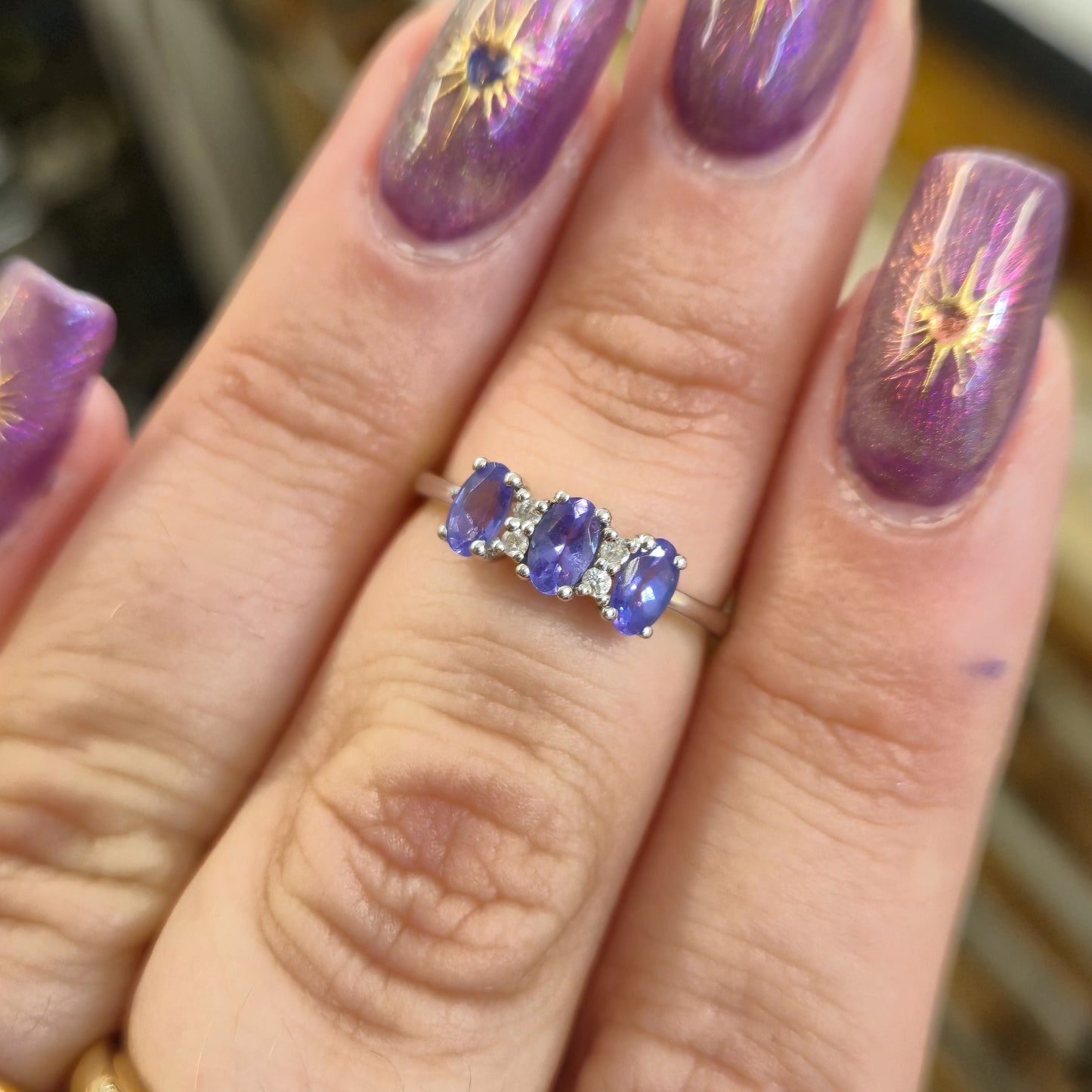 14ct White Gold Three Stone Oval Cut Tanzanite and Diamond Row Ring