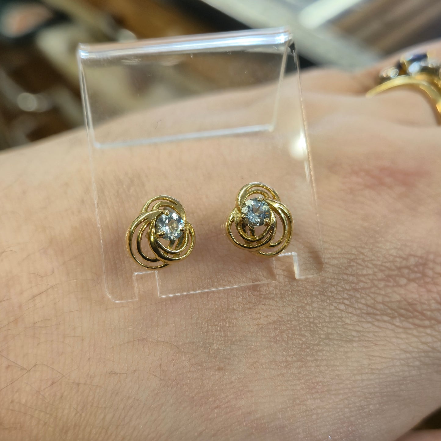 9ct Yellow Gold Open Work Swirly Blue Topaz Stud Earrings