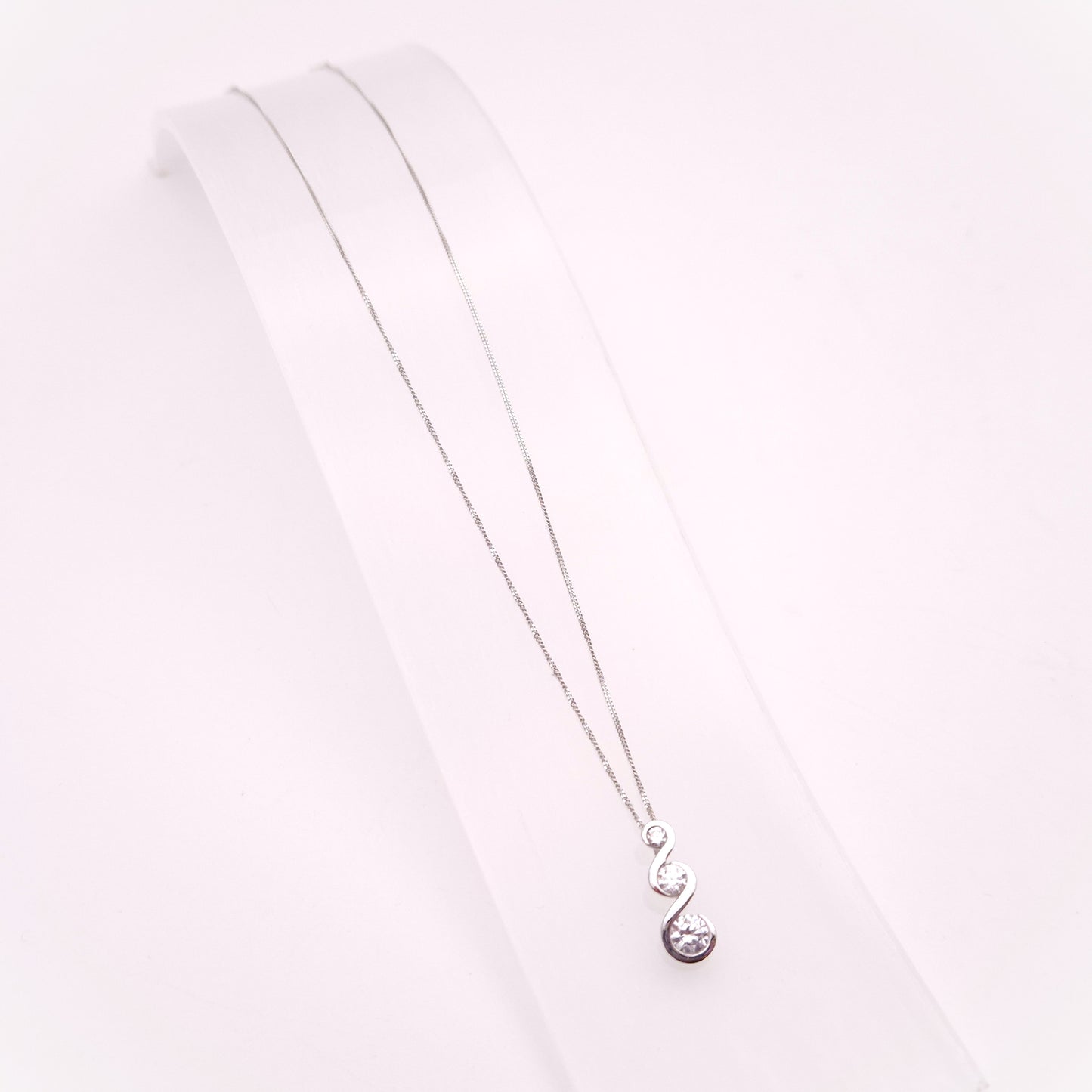 9ct White Gold Graduated Three Stone Cubic Zirconia Pendant and Chain Necklace