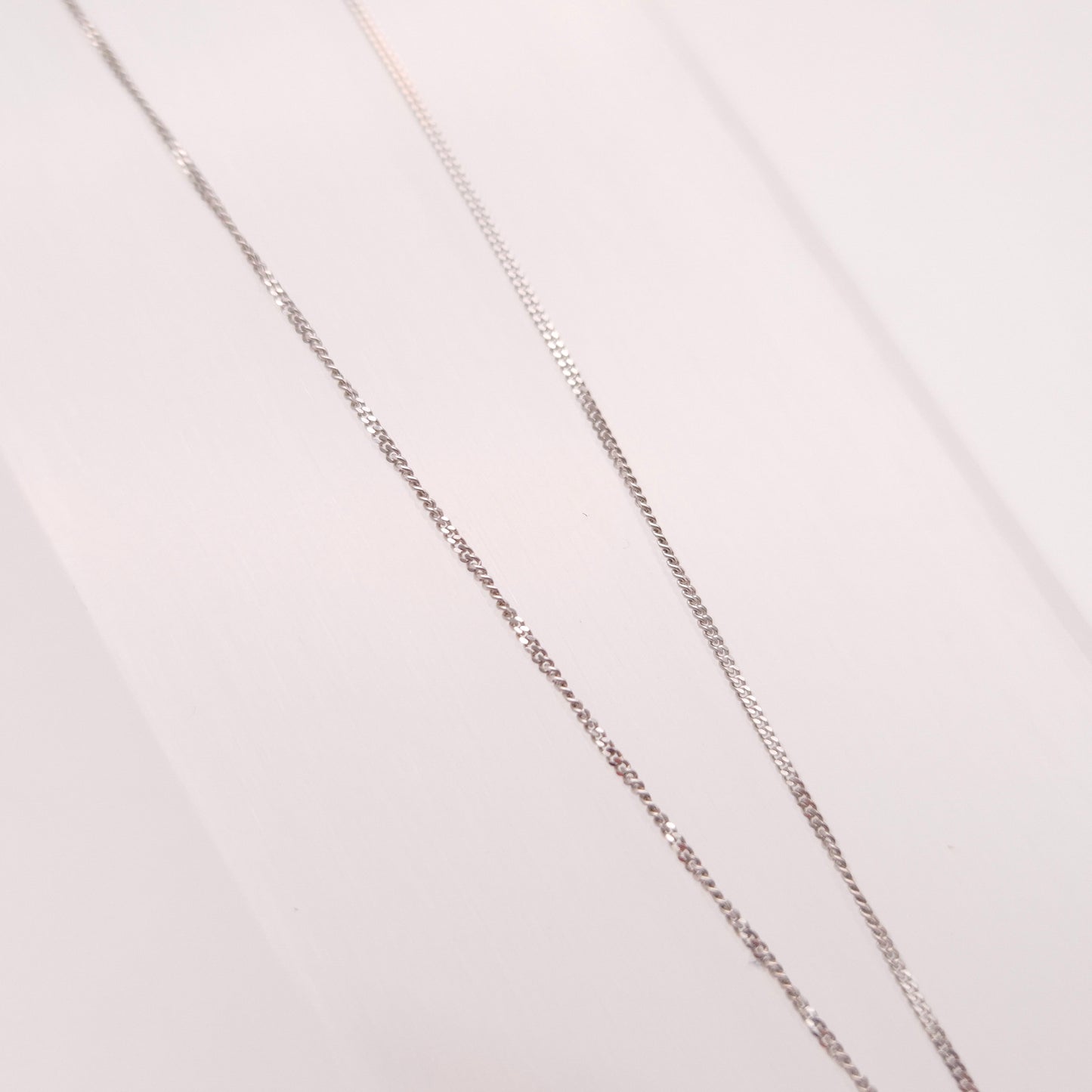 9ct White Gold Graduated Three Stone Cubic Zirconia Pendant and Chain Necklace