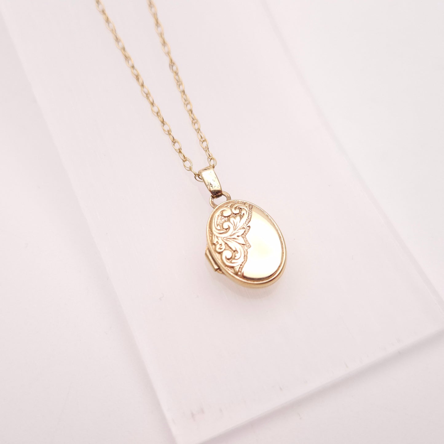 9ct Yellow Gold Small Oval Half Patterned Locket and Chain Necklace