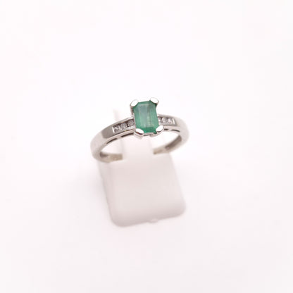 18ct White Gold Emerald Cut Emerald and Diamond Set Shoulders Ring