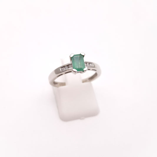 18ct White Gold Emerald Cut Emerald and Diamond Set Shoulders Ring