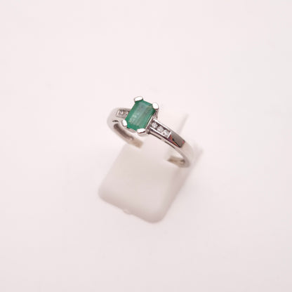 18ct White Gold Emerald Cut Emerald and Diamond Set Shoulders Ring