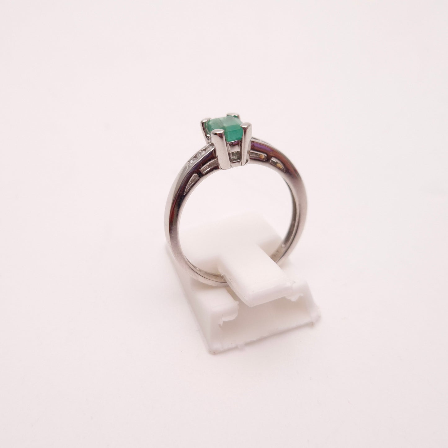18ct White Gold Emerald Cut Emerald and Diamond Set Shoulders Ring