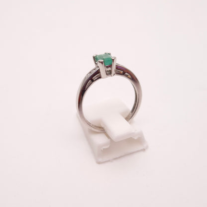 18ct White Gold Emerald Cut Emerald and Diamond Set Shoulders Ring