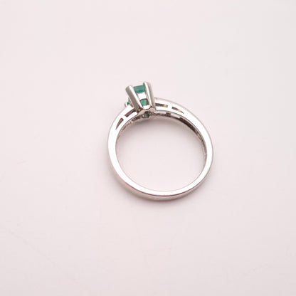 18ct White Gold Emerald Cut Emerald and Diamond Set Shoulders Ring