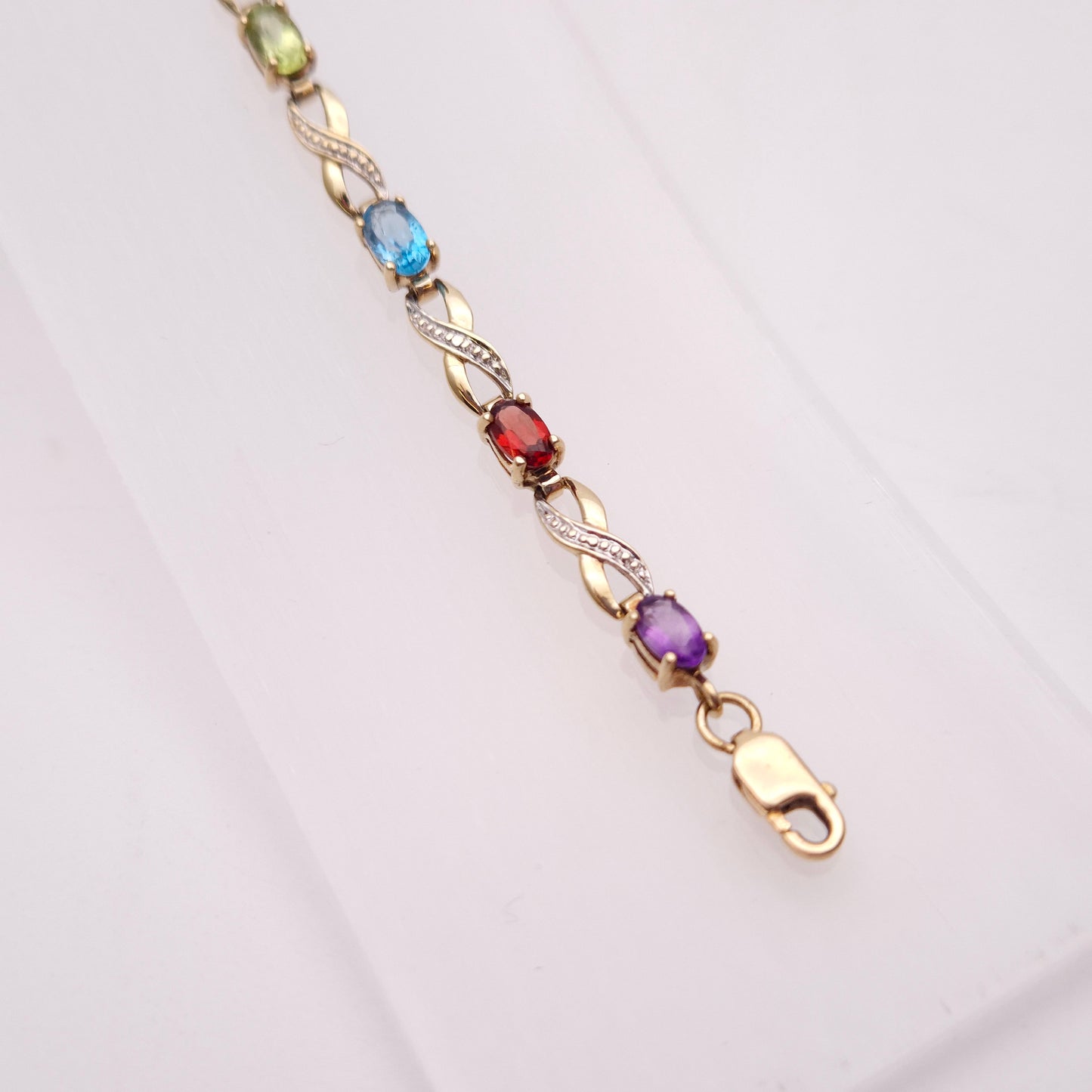 9ct Yellow Gold Rainbow Gemstone Bracelet with Garnet, Amethyst, Peridot etc.