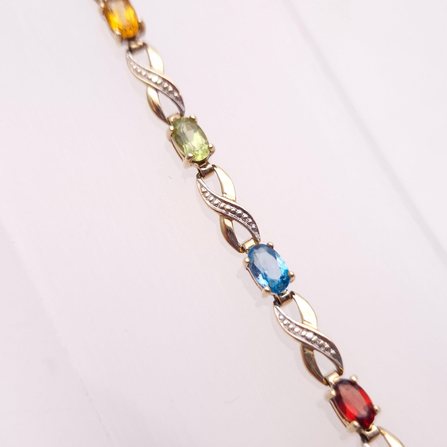9ct Yellow Gold Rainbow Gemstone Bracelet with Garnet, Amethyst, Peridot etc.
