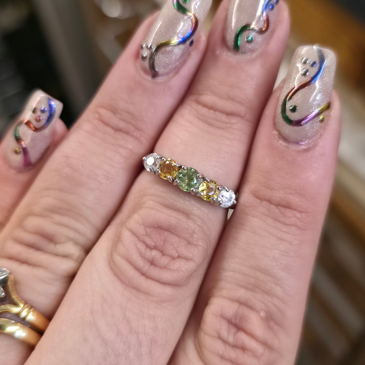 9ct White Gold Vari-Hue Green , Yellow, White Sapphire Five Stone Row Ring