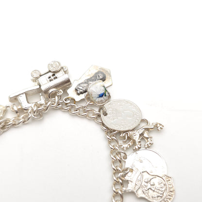 Sterling Silver Vintage Charm Bracelet With Multiple Charms Inc. Caravan etc