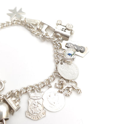 Sterling Silver Vintage Charm Bracelet With Multiple Charms Inc. Caravan etc