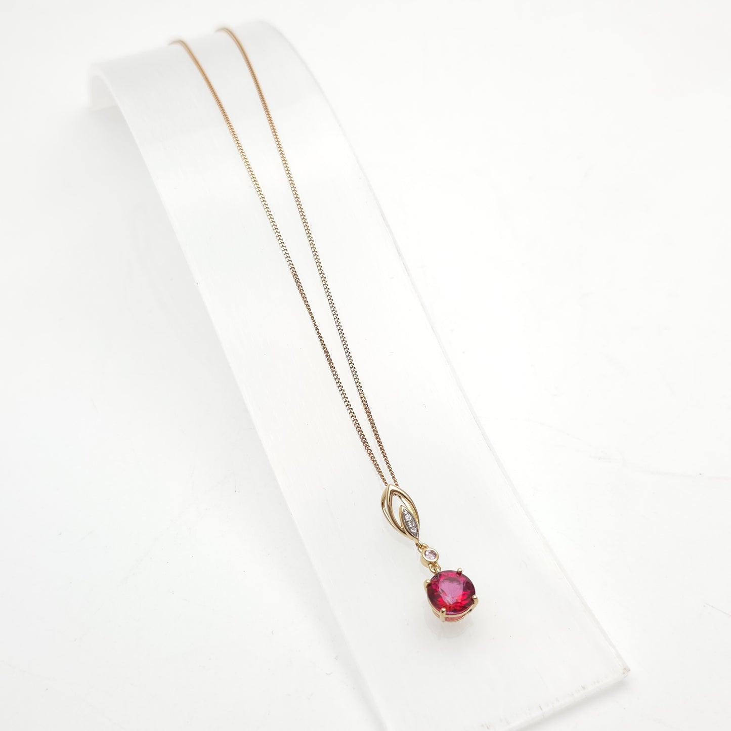 14ct Yellow Gold Red and Pink Topaz And Diamond Pendant on 9ct Gold Curb Chain