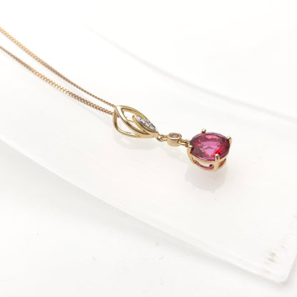 14ct Yellow Gold Red and Pink Topaz And Diamond Pendant on 9ct Gold Curb Chain
