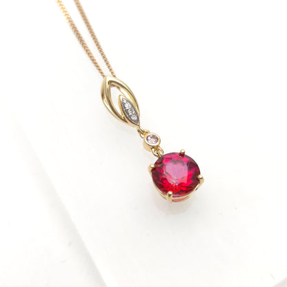 14ct Yellow Gold Red and Pink Topaz And Diamond Pendant on 9ct Gold Curb Chain