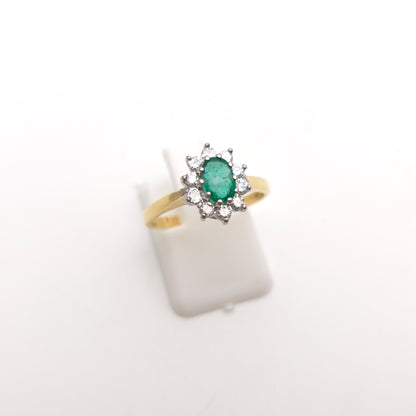 18ct Yellow Gold Traditional Oval Cut Emerald And Diamond Cluster Ring