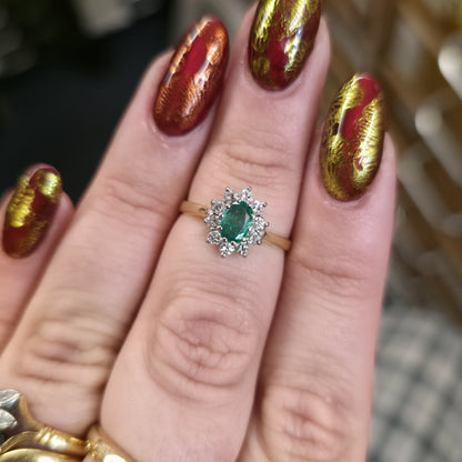 18ct Yellow Gold Traditional Oval Cut Emerald And Diamond Cluster Ring