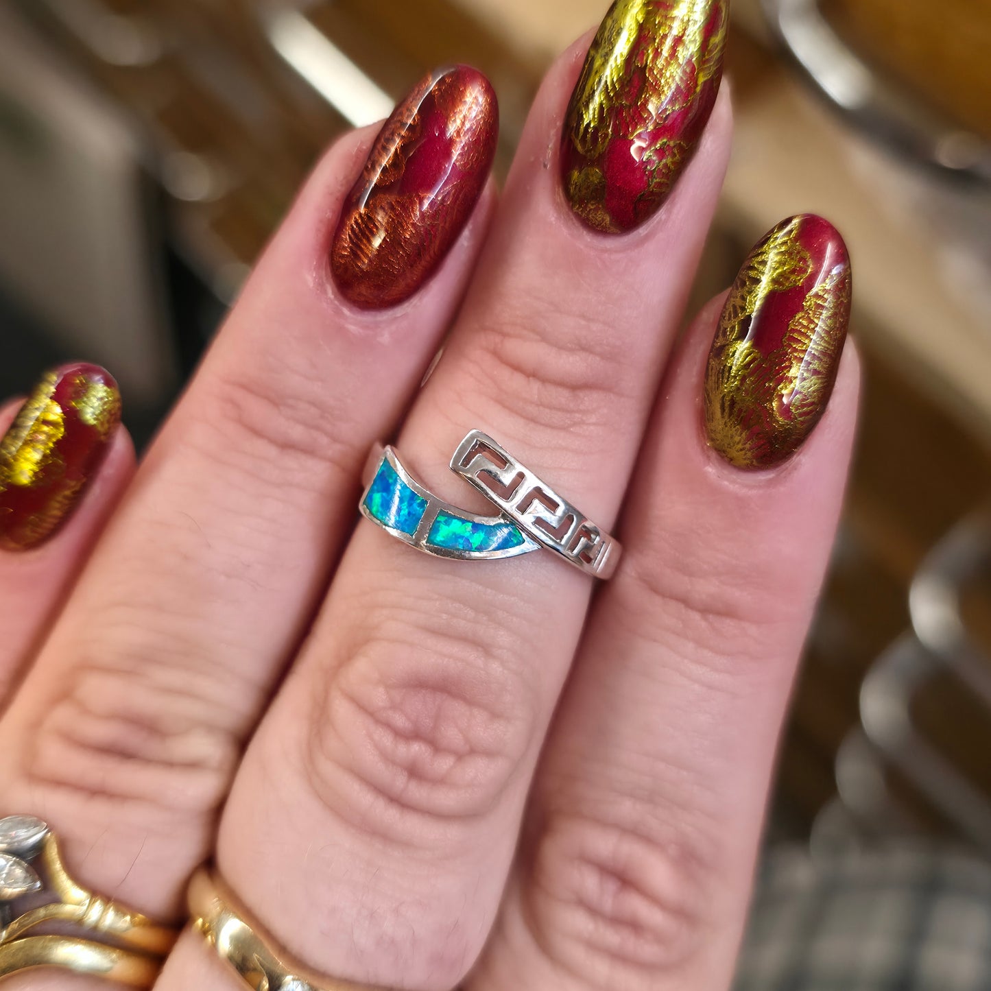 Sterling Silver Blue Synthetic Opal Cut Out Detail Crossover Ring