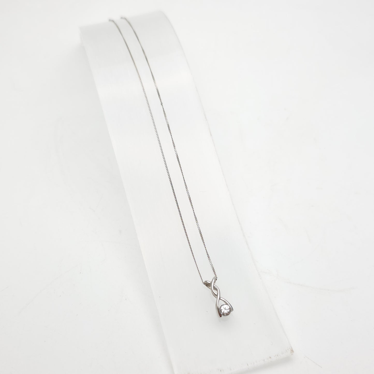 9ct White Gold Lightweight Twist Style Cubic Zirconia Pendant And Chain Necklace