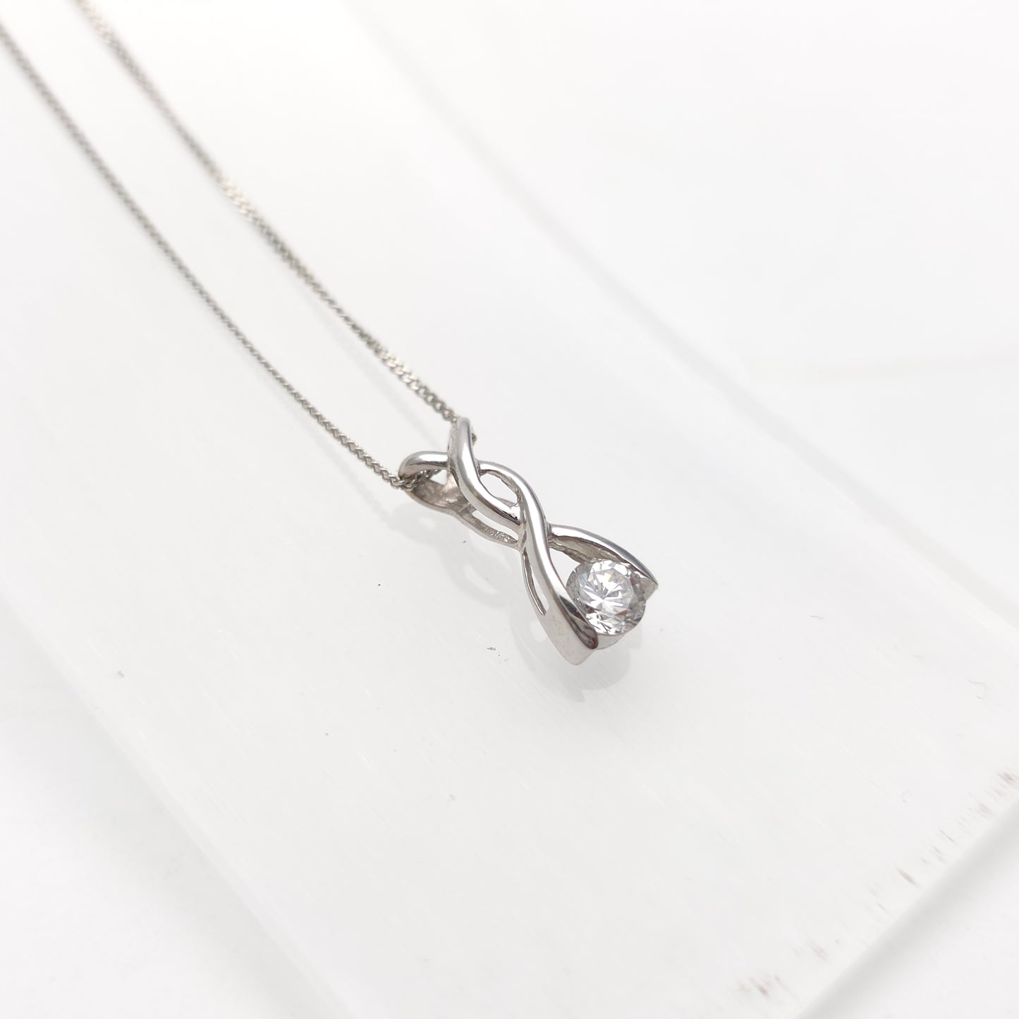 9ct White Gold Lightweight Twist Style Cubic Zirconia Pendant And Chain Necklace