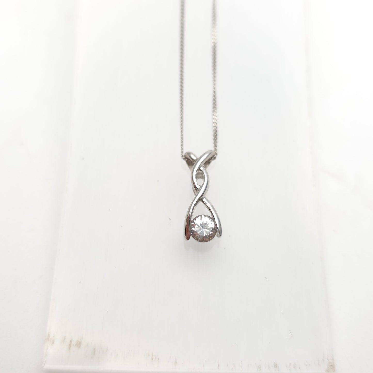 9ct White Gold Lightweight Twist Style Cubic Zirconia Pendant And Chain Necklace