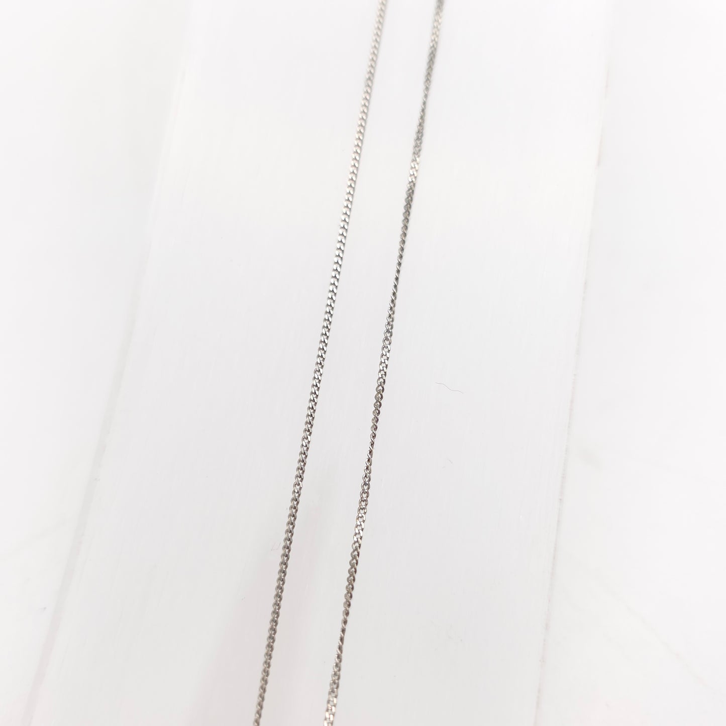 9ct White Gold Lightweight Twist Style Cubic Zirconia Pendant And Chain Necklace