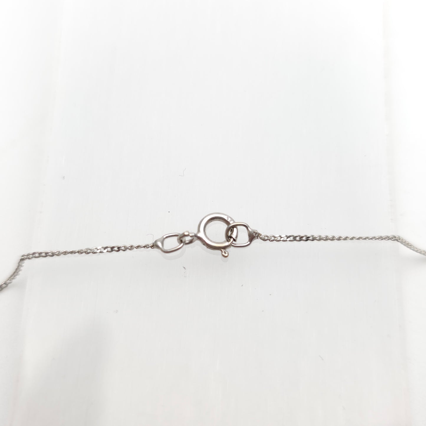 9ct White Gold Lightweight Twist Style Cubic Zirconia Pendant And Chain Necklace