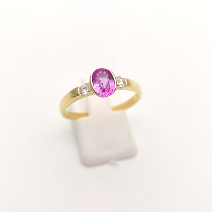 18ct Yellow Gold Oval Cut Half Bezel Set Pink Sapphire And Diamond Trilogy Ring