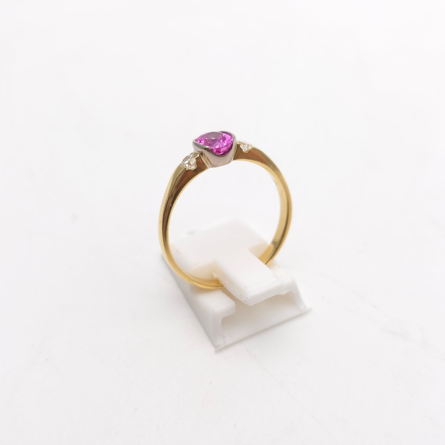 18ct Yellow Gold Oval Cut Half Bezel Set Pink Sapphire And Diamond Trilogy Ring