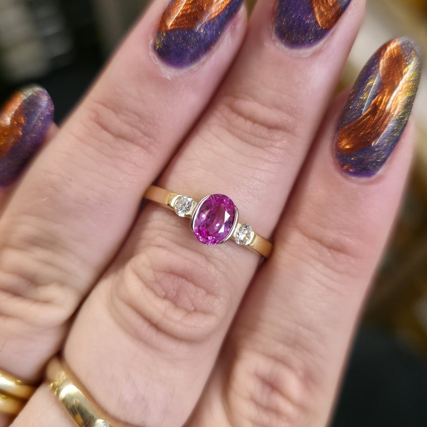 18ct Yellow Gold Oval Cut Half Bezel Set Pink Sapphire And Diamond Trilogy Ring