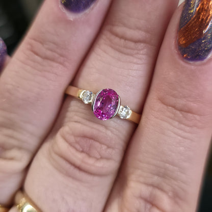 18ct Yellow Gold Oval Cut Half Bezel Set Pink Sapphire And Diamond Trilogy Ring