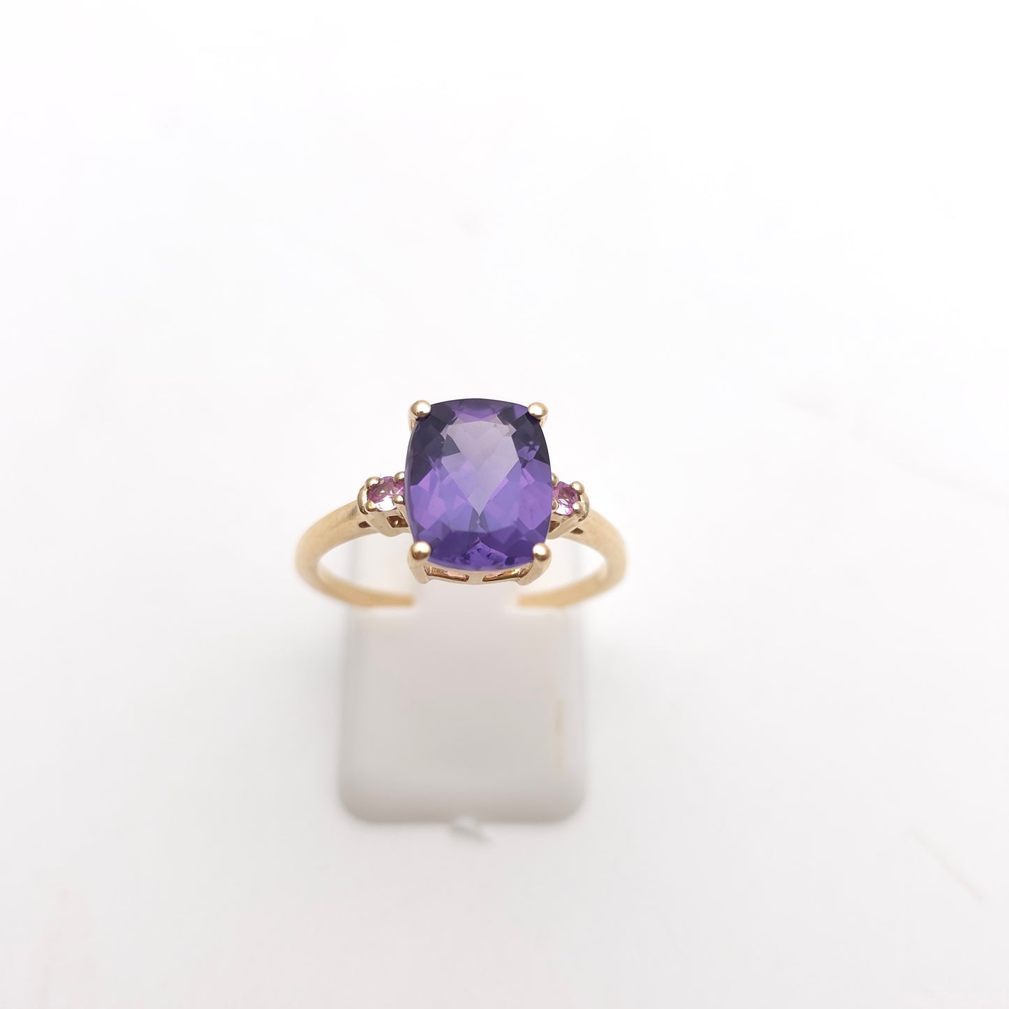 9ct Yellow Gold Cushion Cut Amethyst And Pink Stone Trilogy Ring