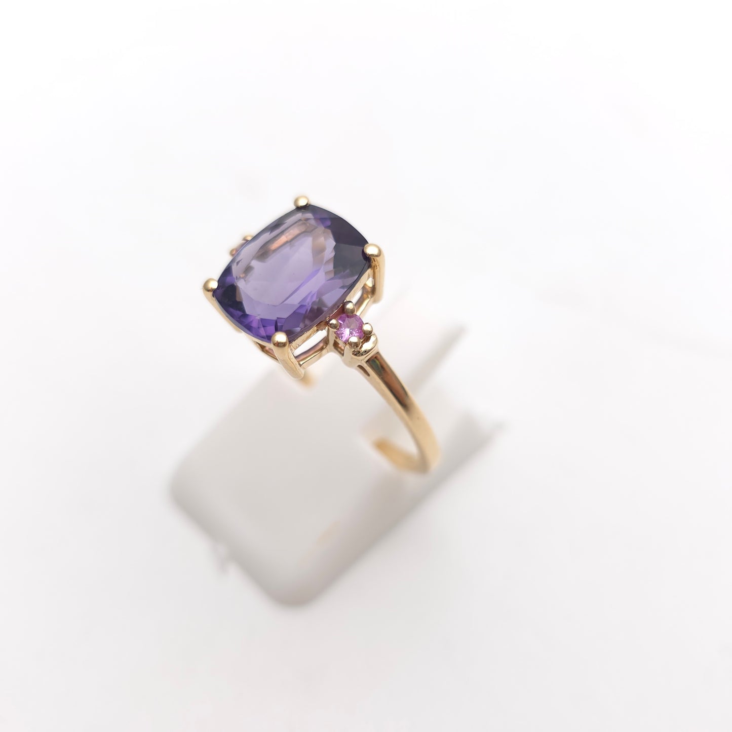 9ct Yellow Gold Cushion Cut Amethyst And Pink Stone Trilogy Ring