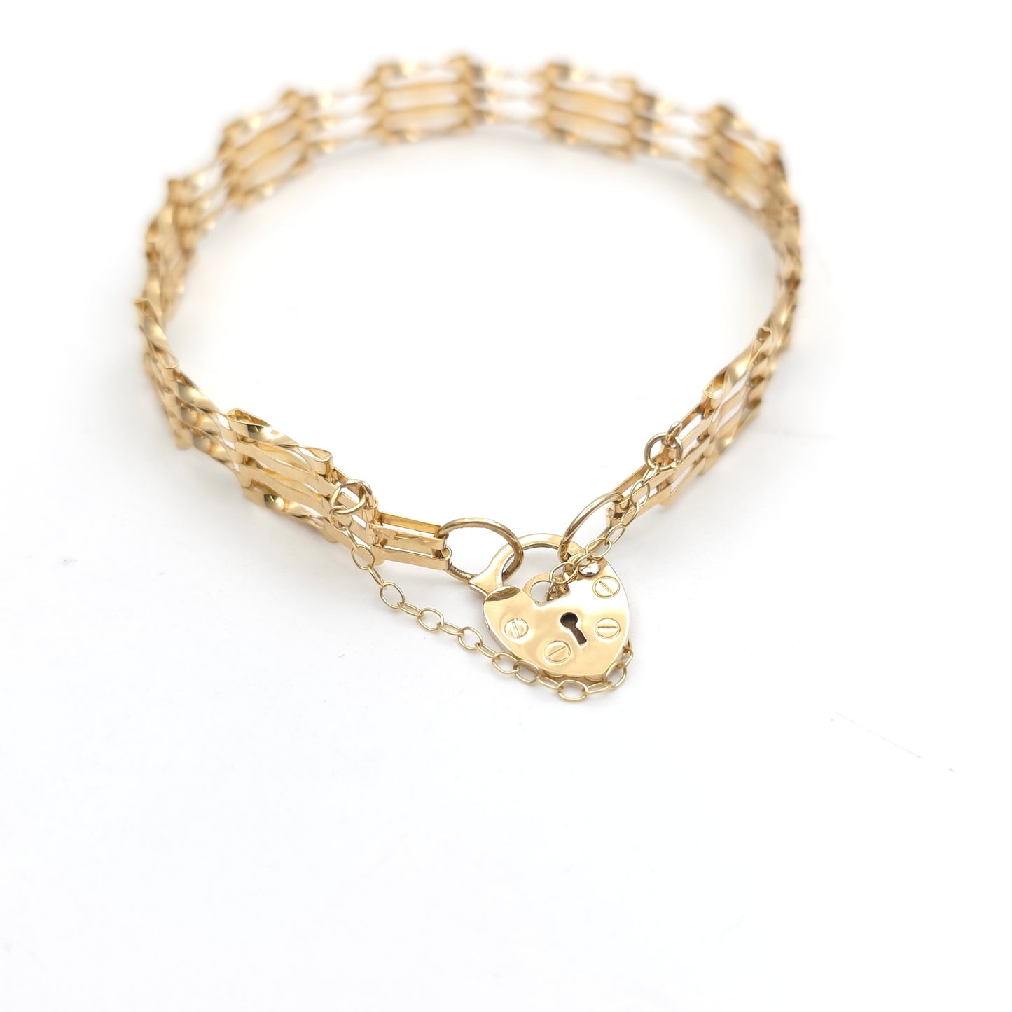 9ct Yellow Lightweight Slimline Twisted Link Gate Bracelet With Heart Lock Catch