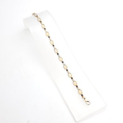 9ct Yellow Gold Vintage Flashy 'Jelly' Opal And Dark Sapphire Gemstone Bracelet