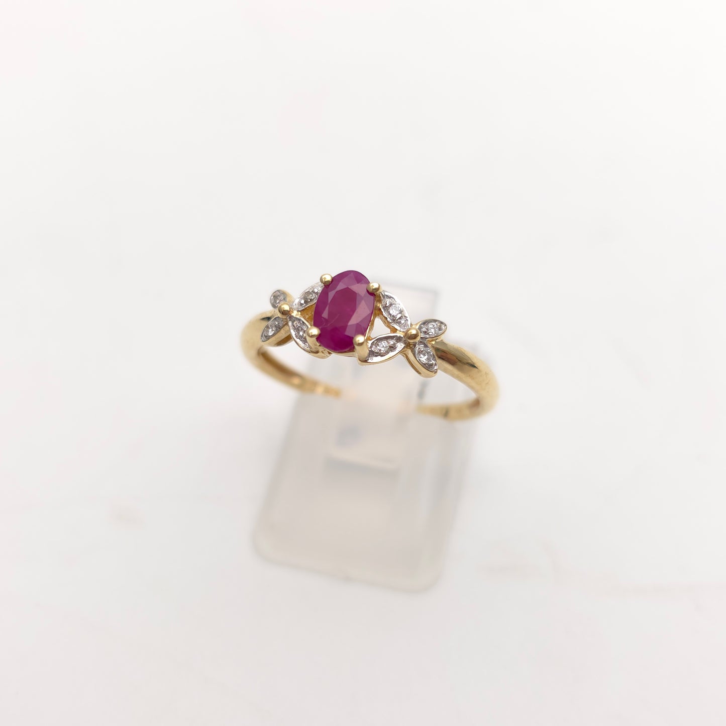 9ct Yellow Gold Pretty Oval Cut Ruby And Diamond Set Cut-out Shoulder Ring