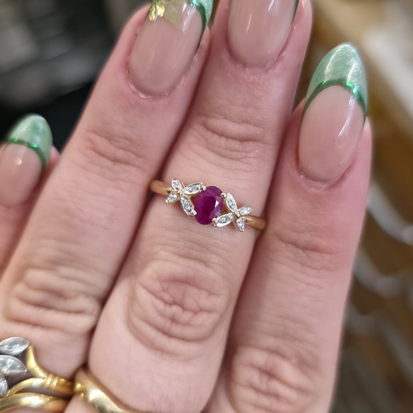 9ct Yellow Gold Pretty Oval Cut Ruby And Diamond Set Cut-out Shoulder Ring