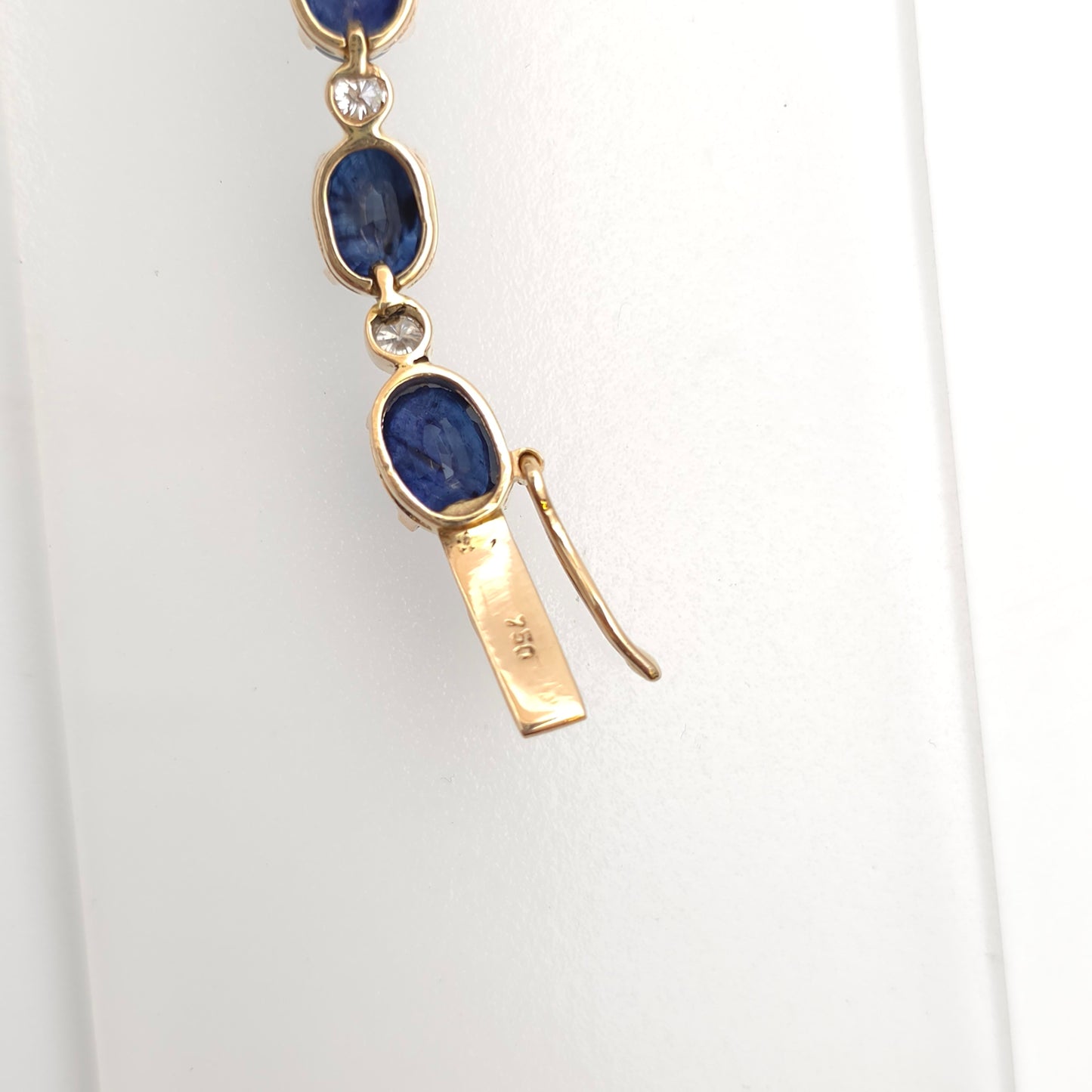 18ct Yellow Gold Oval Cut Sapphire And Small Round Cut Diamond Tennis Bracelet